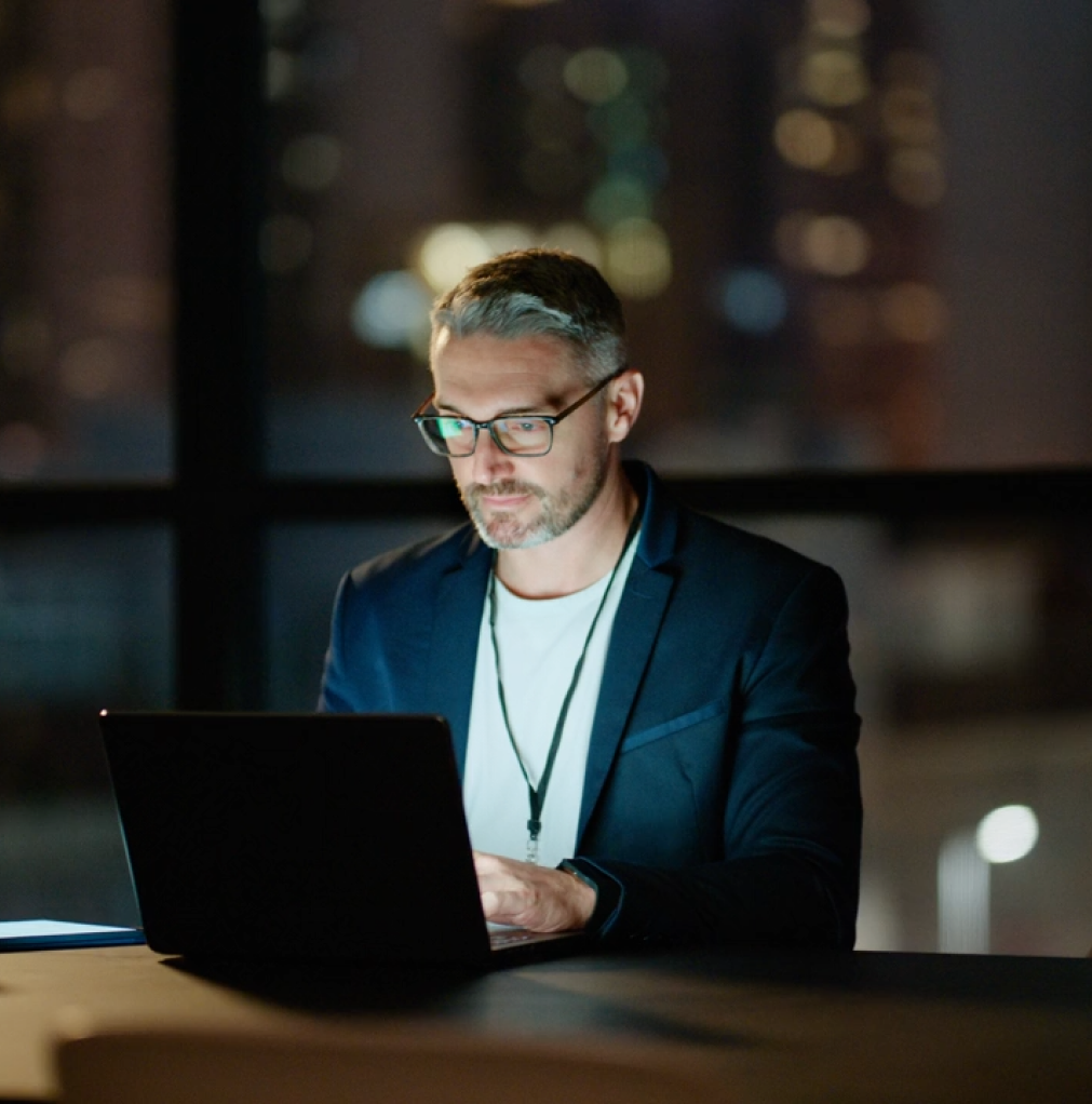 Professional using AI-supported recruiting tools on a laptop